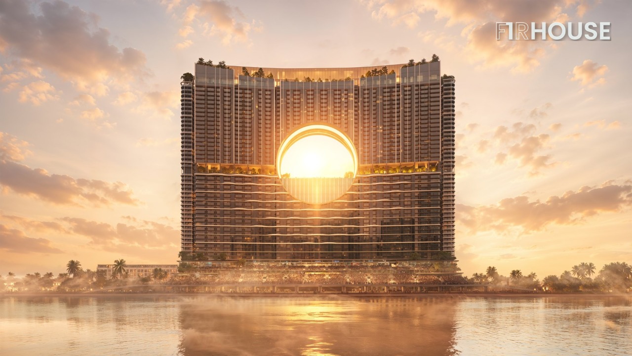 Mặt tiền Sun Galaxy Đà Nẵng lúc hoàng hôn – vòm Moon Gate 69m sáng lên như một vầng trăng bên sông Hàn.